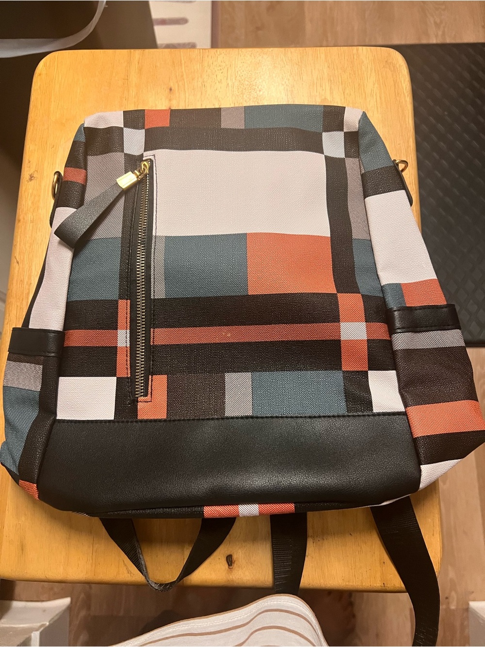 Woman’s Geometric Pattern Backpack in Rust, Teal & Black